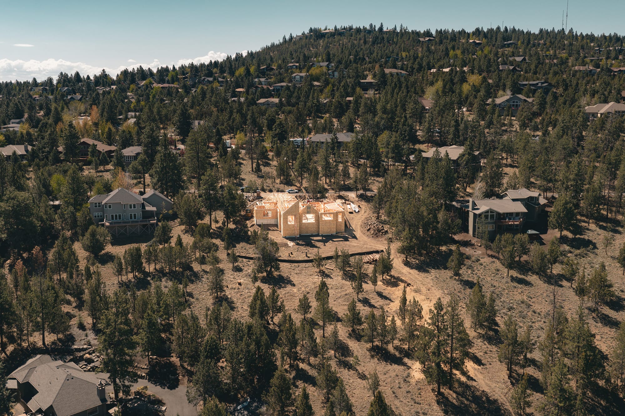 Aerial view of the Awbrey Butte custom craftsman home under construction in Bend, Oregon