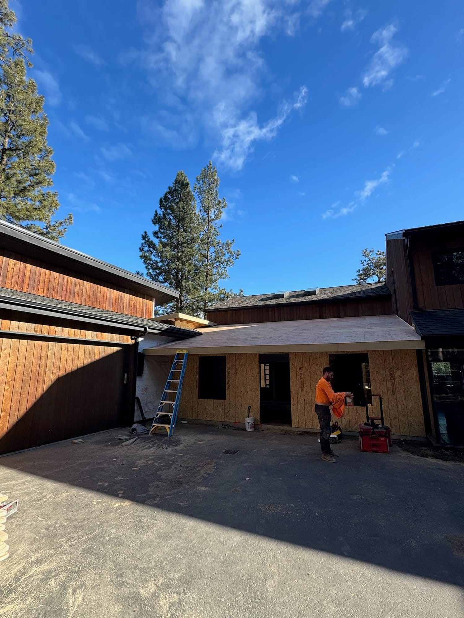 Addition framed onto an existing cedar-sided home in Sunrise Village