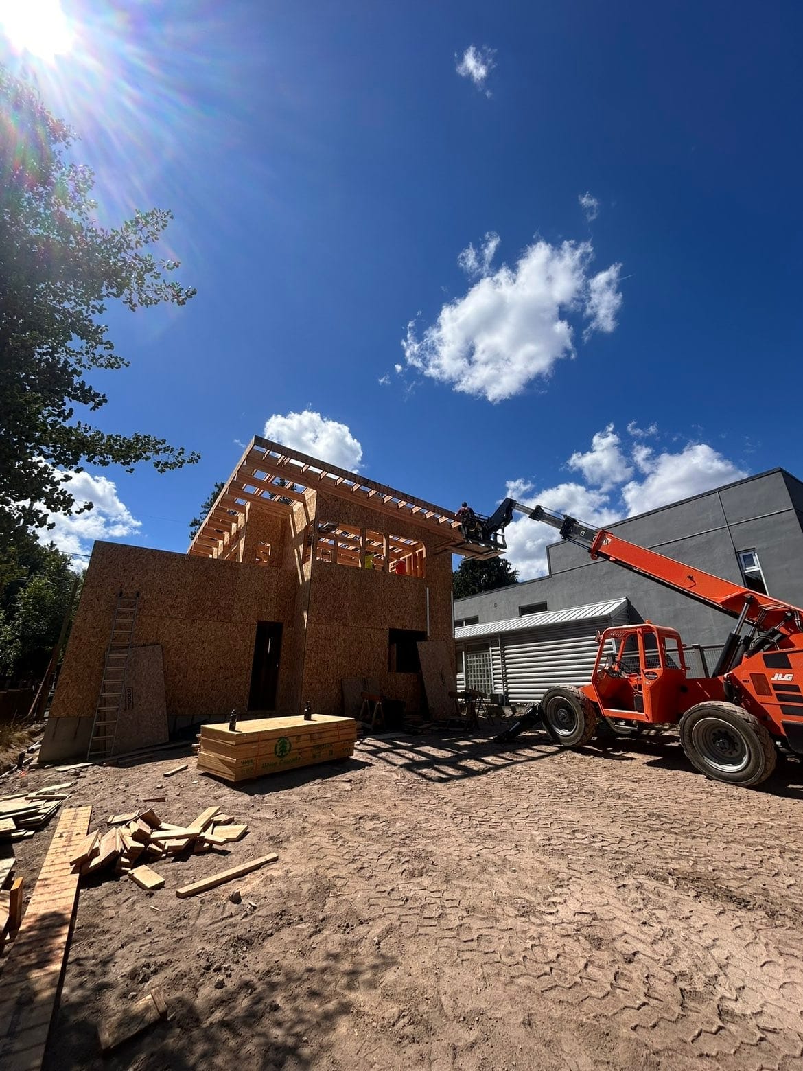 Contemporary two-story build at framing stage in downtown Bend
